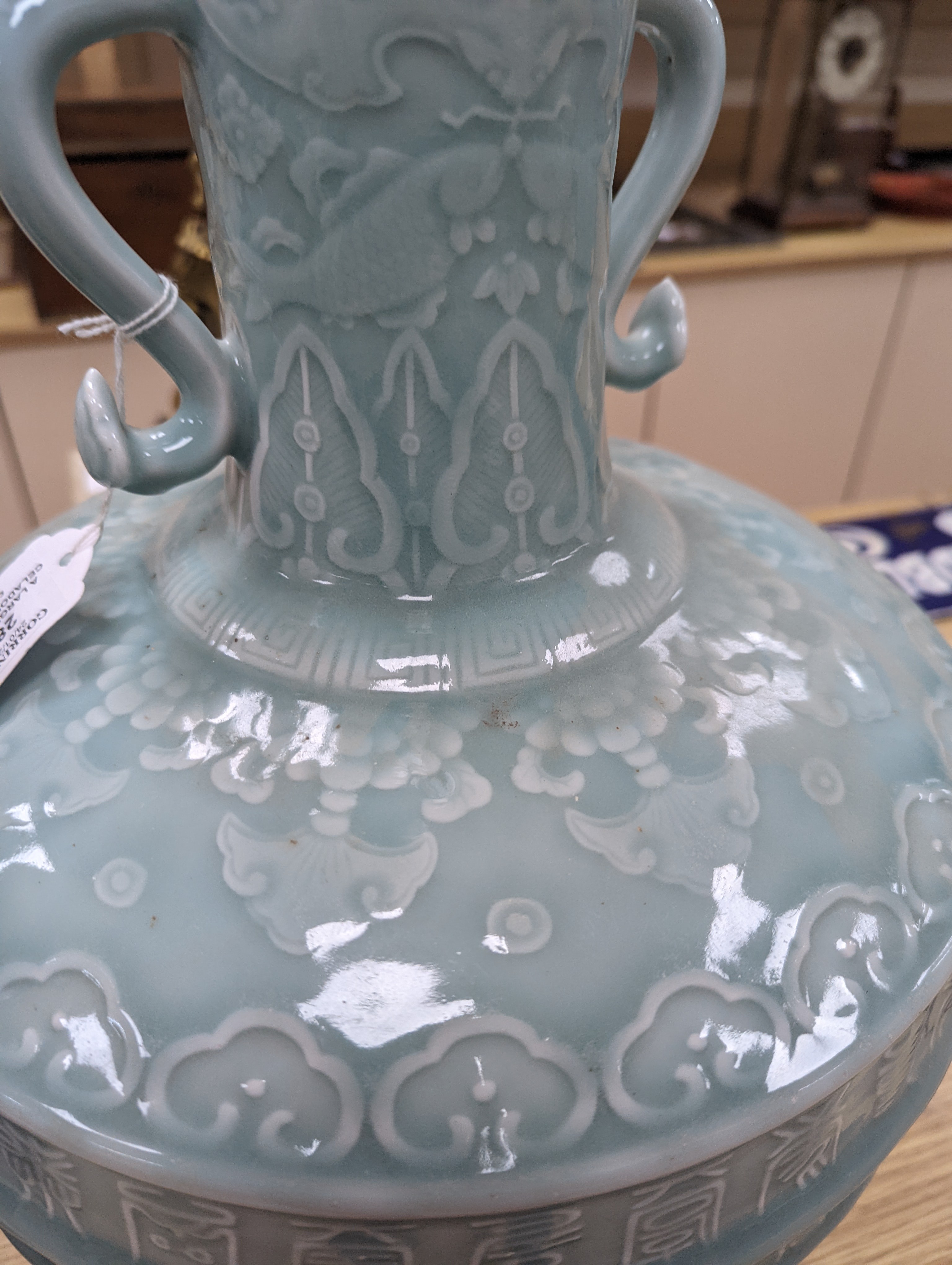A large Chinese celadon glazed ‘Hundred Shou’ vase 41cm